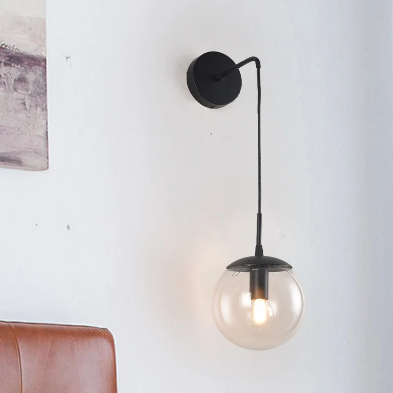 Applique murale sphère en verre transparent/gris fumé, lampe murale rétro à 1 lumière avec alargado bras doré/noir