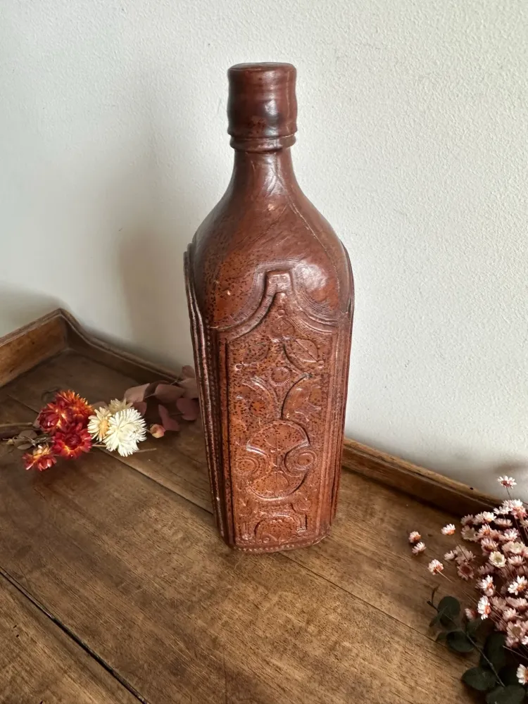 Acero Inoxidable Bouteille recouverte de cuire