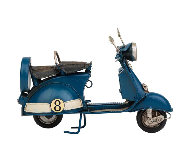 Moto de metálico en color azul mide 17x7x11h cm