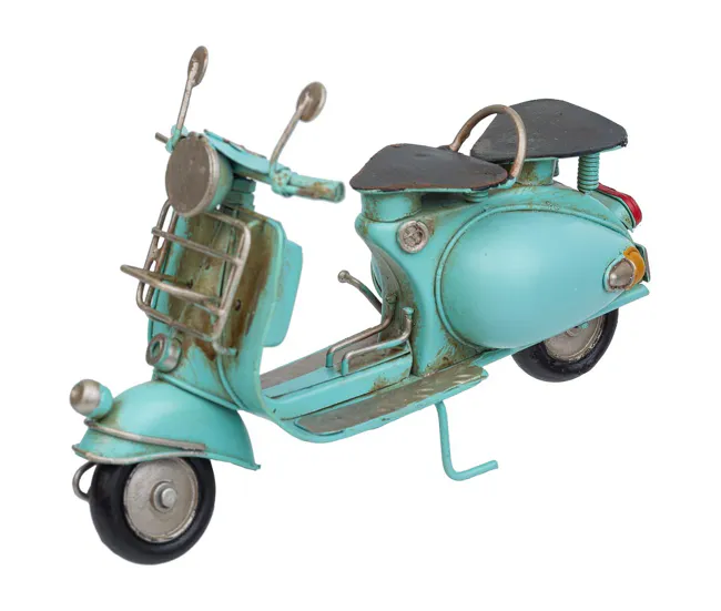Motocicleta de acero en un tono azul atractivo mide 17x7.5x11.5h cm