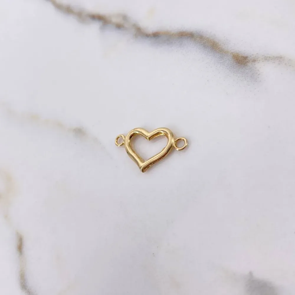 Herraje Silueta Corazon 1.25gr / 2.3cm / Liso Oro Amarillo $ con Filio de Acero al Carbono